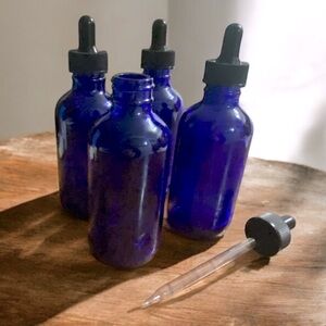 NWOT Set of Four Glass Cobalt Blue Bottle Droppers